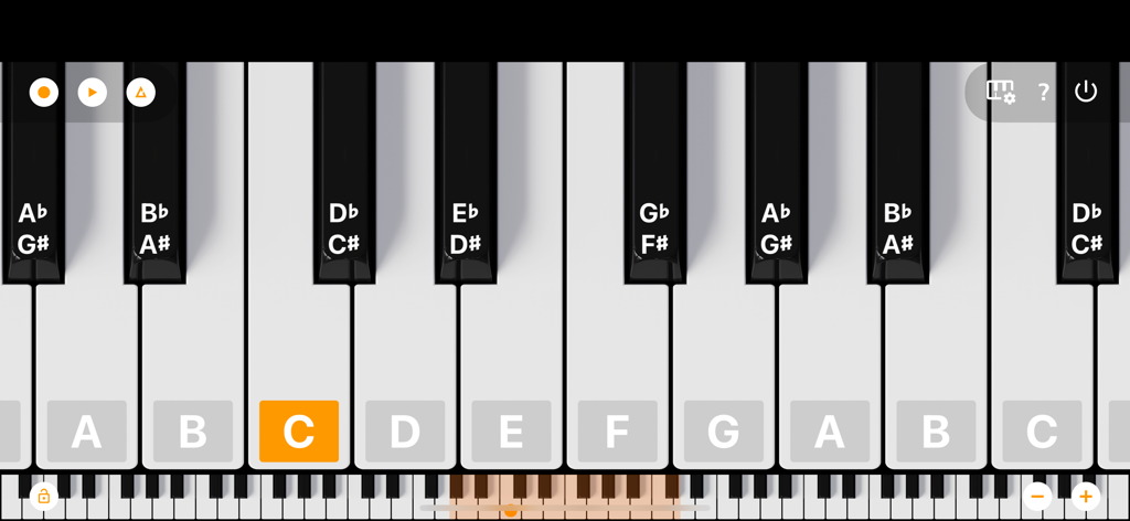 Una captura de pantalla de la interfaz de la aplicación Mini Piano Lite que muestra las teclas del piano con etiquetas de letras para aprender las notas