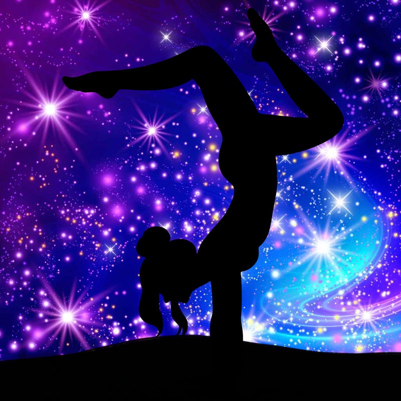 a woman doing a handstand