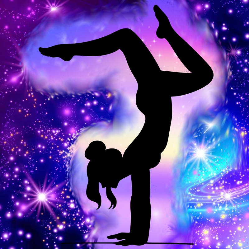 a woman doing a handstand