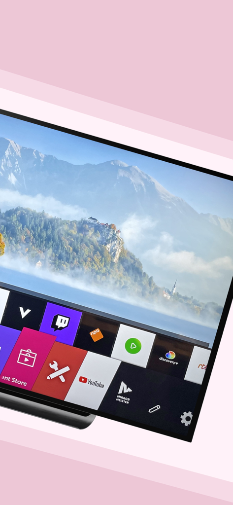 Magic Remote Control WebOS TV - Pantalla de Smart TV mostrando un paisaje montañoso y un menú de aplicaciones de streaming como YouTube y Twitch