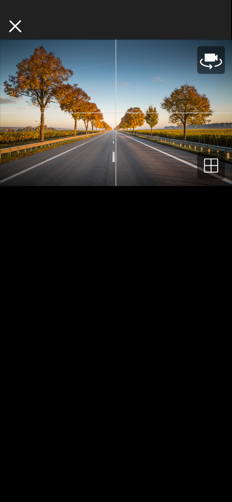 MiVue Pro dash cam live view showing a road with alignment grid for camera setup