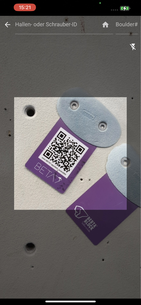 BETA7 - Mobile app scanning a purple QR code tag on a bouldering wall hold to access climbing beta and route info