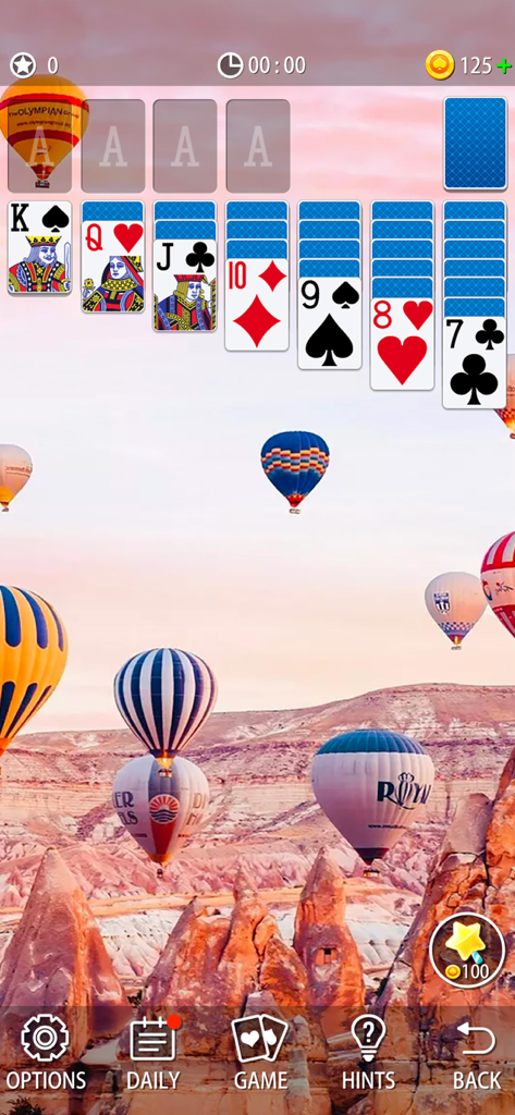 Classic Solitaire game interface with a beautiful hot air balloon background theme