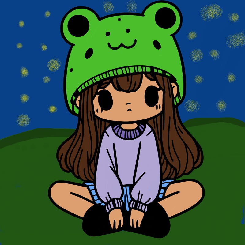 a girl wearing a frog hat and some frog socks