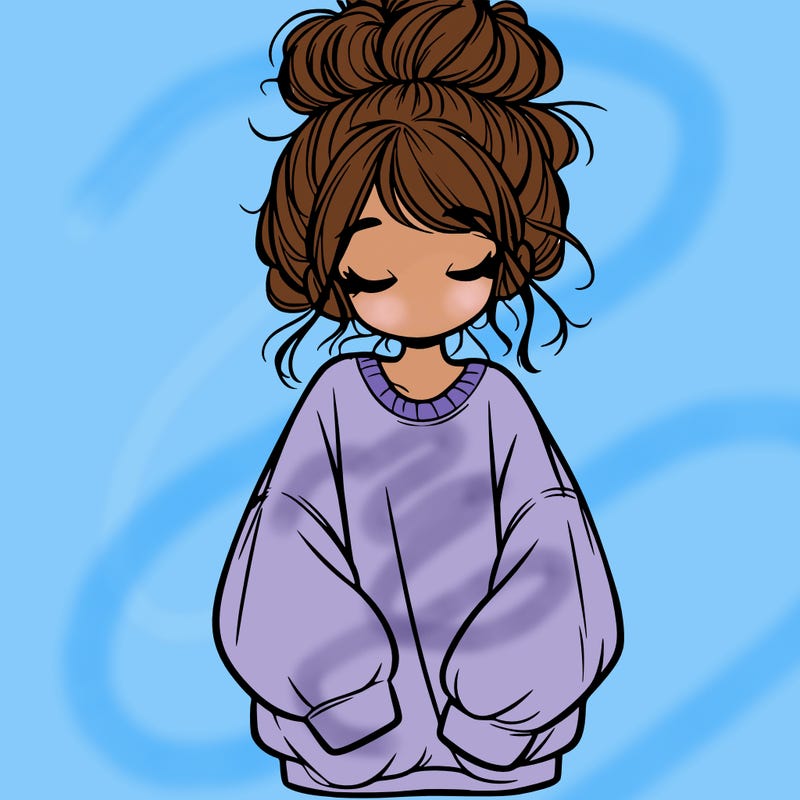 girl with baggy sweatshirt and messy bun