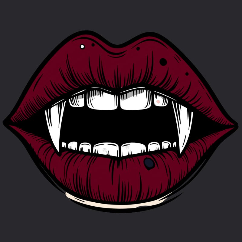 lips with vampire teeth