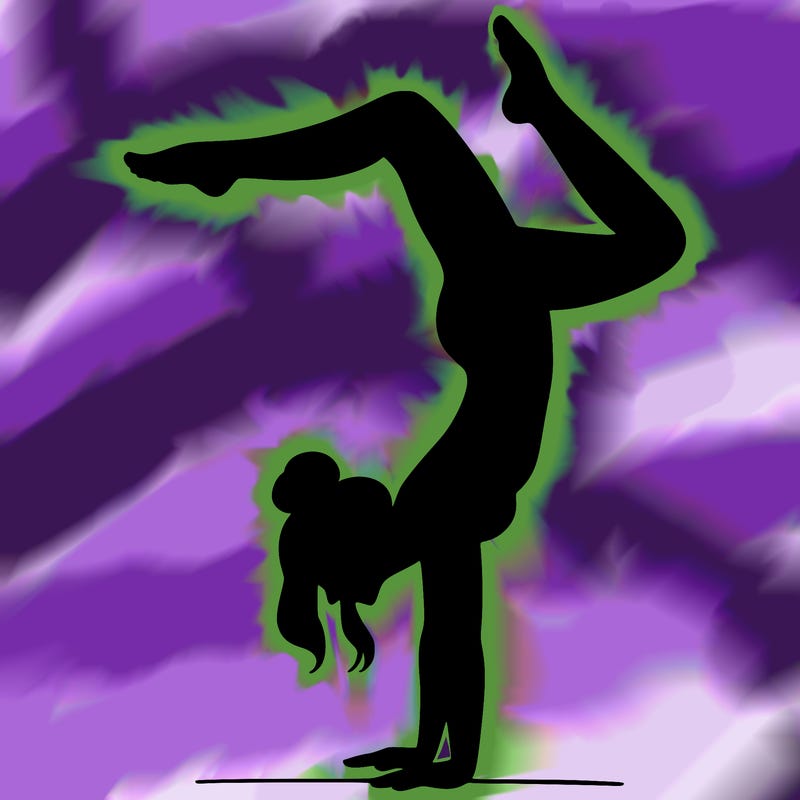 a woman doing a handstand