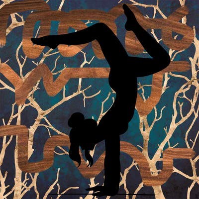 a woman doing a handstand