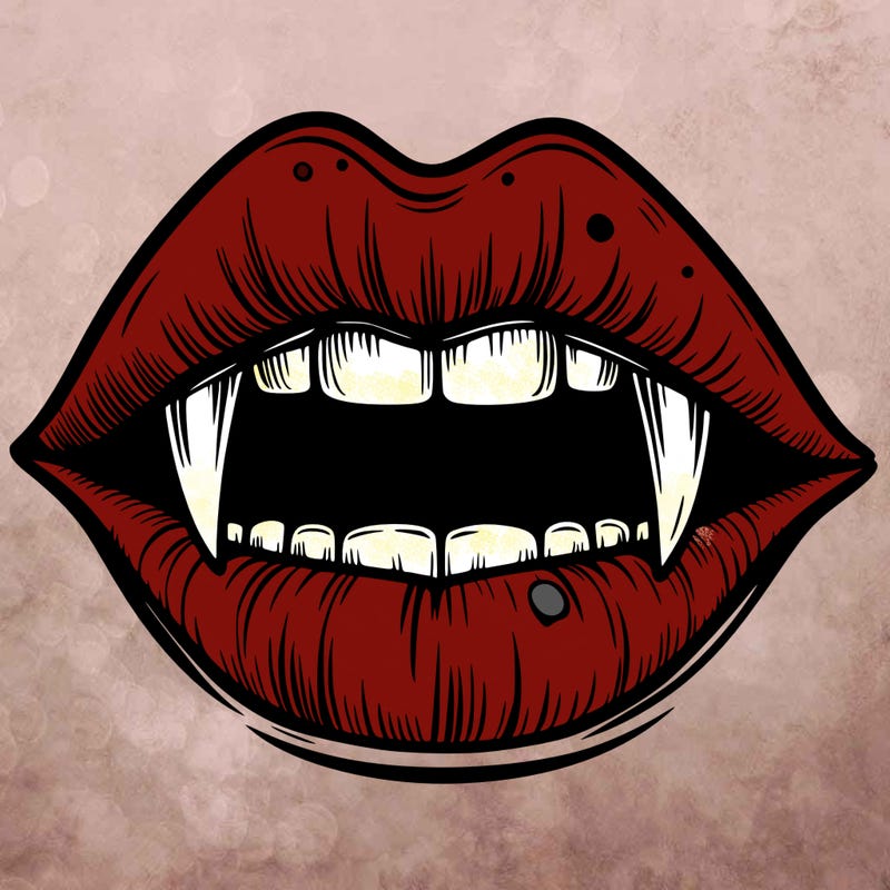 lips with vampire teeth