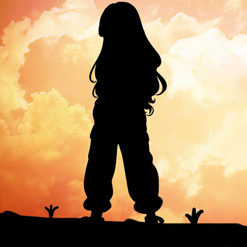 girl in baggy pants crop top and long hair