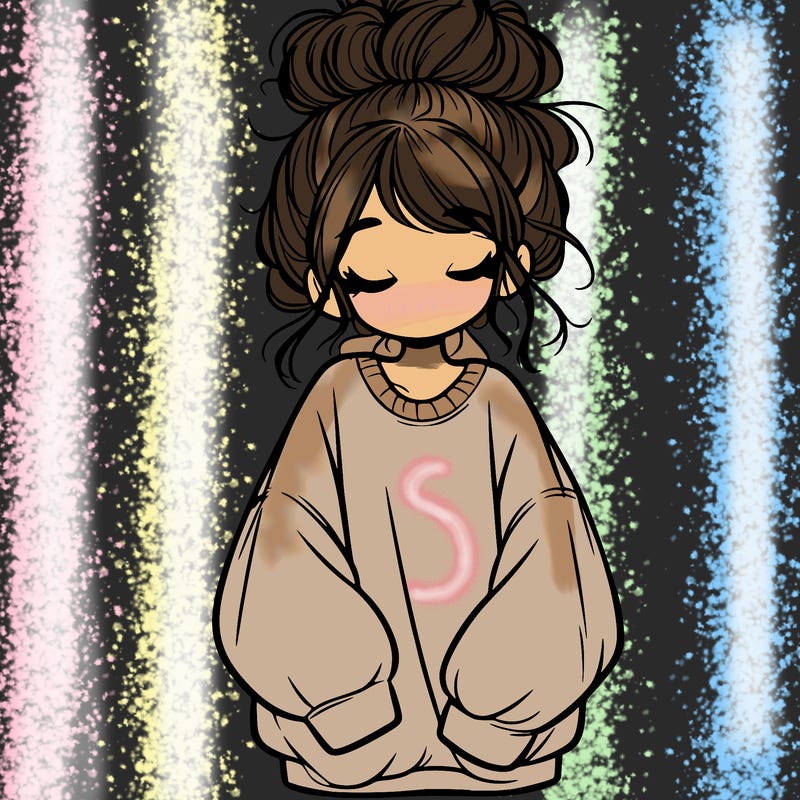 girl with baggy sweatshirt and messy bun
