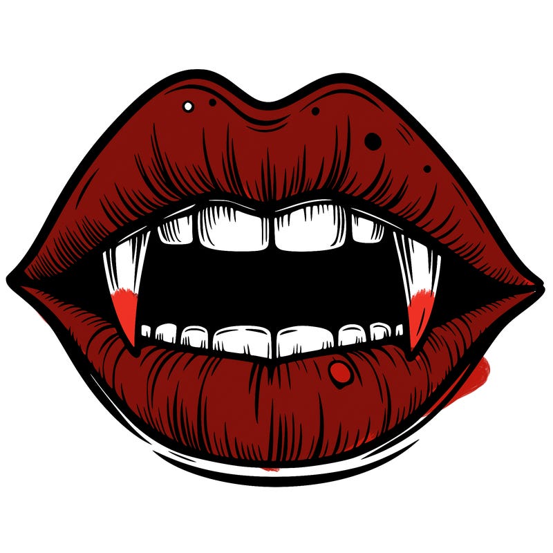 lips with vampire teeth