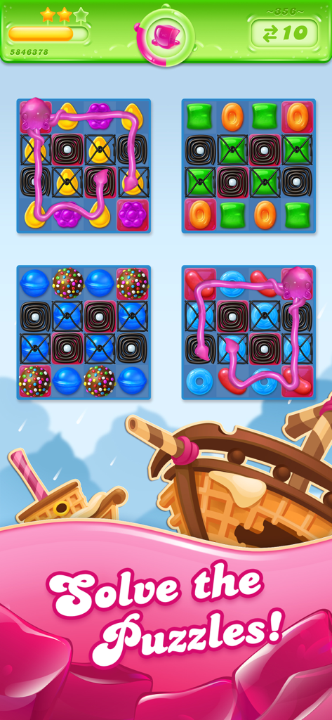 Gameplay screenshot of Candy Crush Jelly Saga showing four candy grids and pink jelly trails