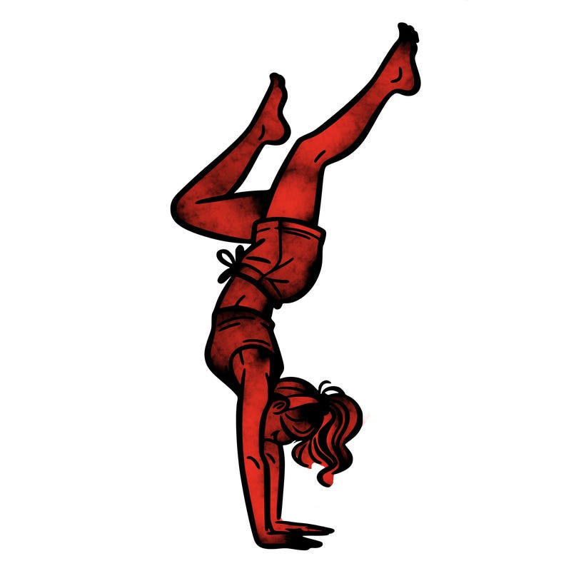 woman doing a hand stand