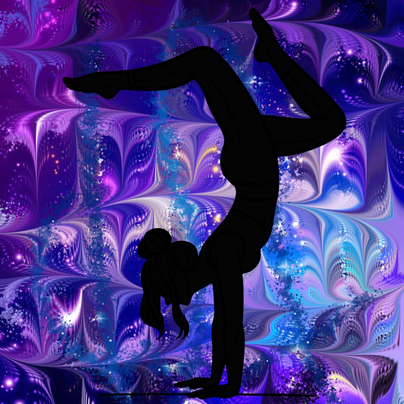 a woman doing a handstand