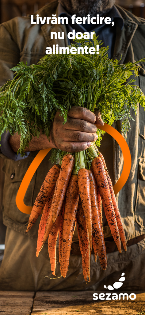 Sezamo - A man holding a bunch of fresh carrots with soil on them representing farm to table delivery by Sezamo