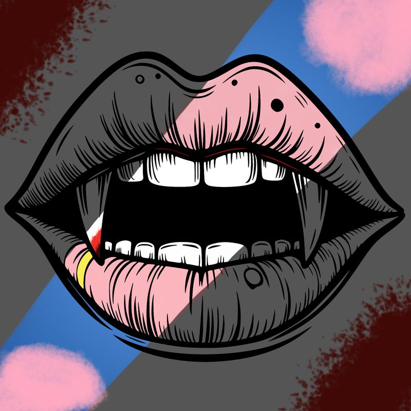 lips with vampire teeth