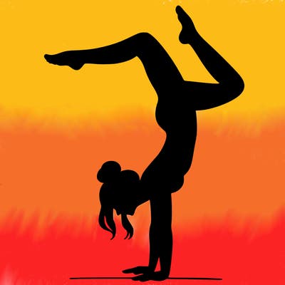 a woman doing a handstand