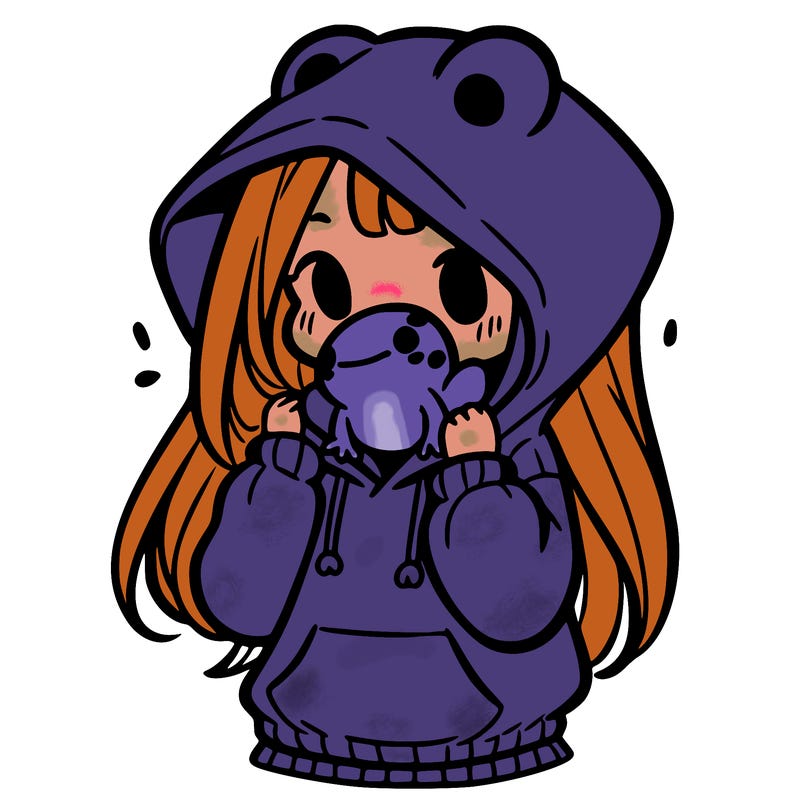 a girl holding a froggy hoodie