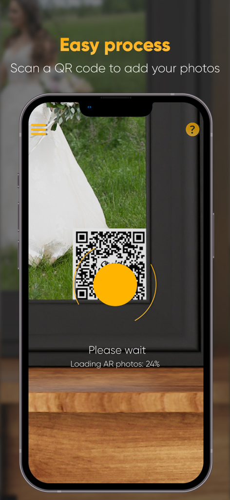 Stories AR - Smartphone scanning a QR code on a photo to activate augmented reality content in Stories AR