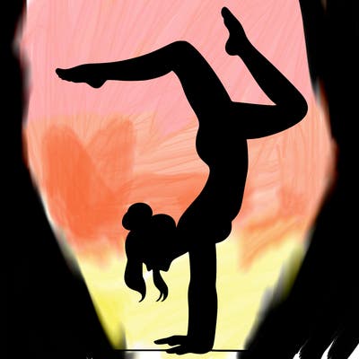 a woman doing a handstand