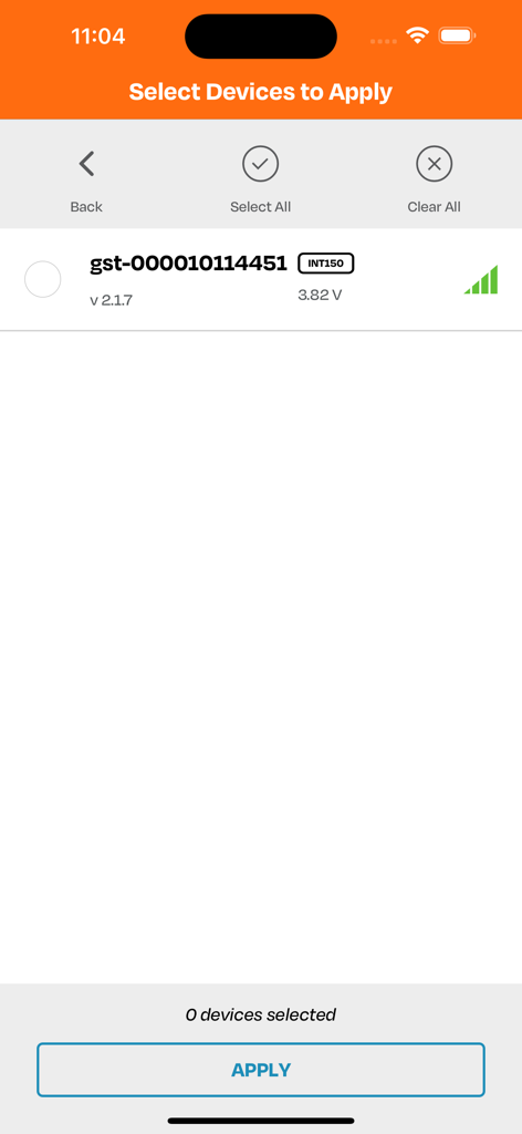 Realm App - Screenshot of the Realm App Select Devices to Apply screen showing a list of Globalstar satellite transmitters with battery and signal status.