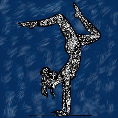 a woman doing a handstand