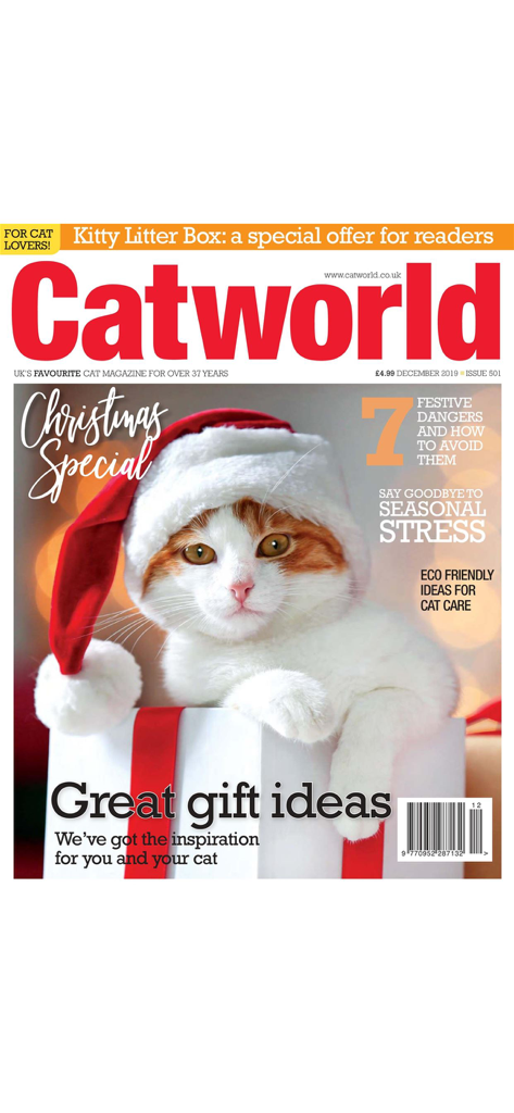 Catworld Magazine - Portada especial de Navidad de la revista Catworld con un gato con sombrero de Santa dentro de una caja de regalo