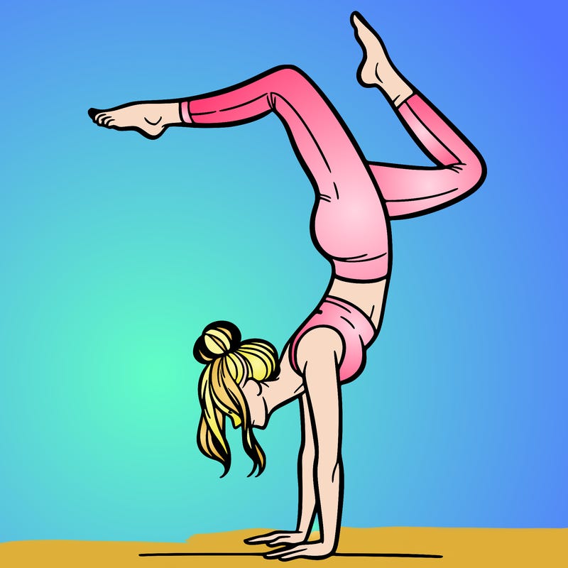 a woman doing a handstand