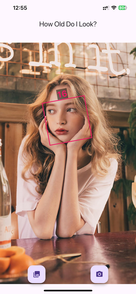 How Old Do I Look? Age Camera - AI age detection interface showing a facial scan result of sixteen on a young woman