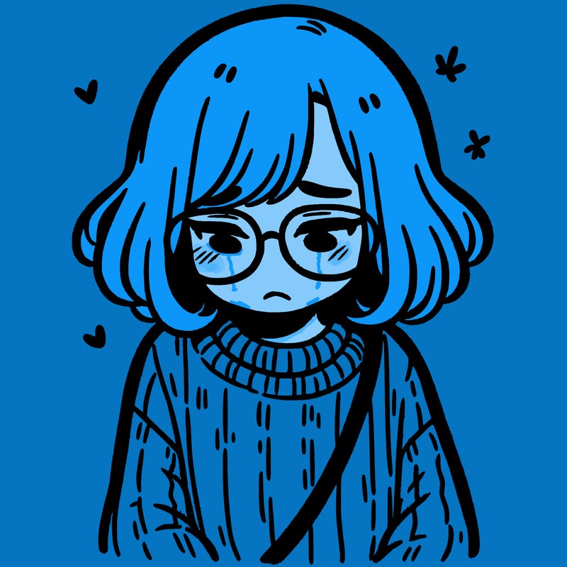 sad girl with glasses in a sweater