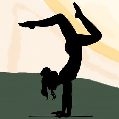a woman doing a handstand