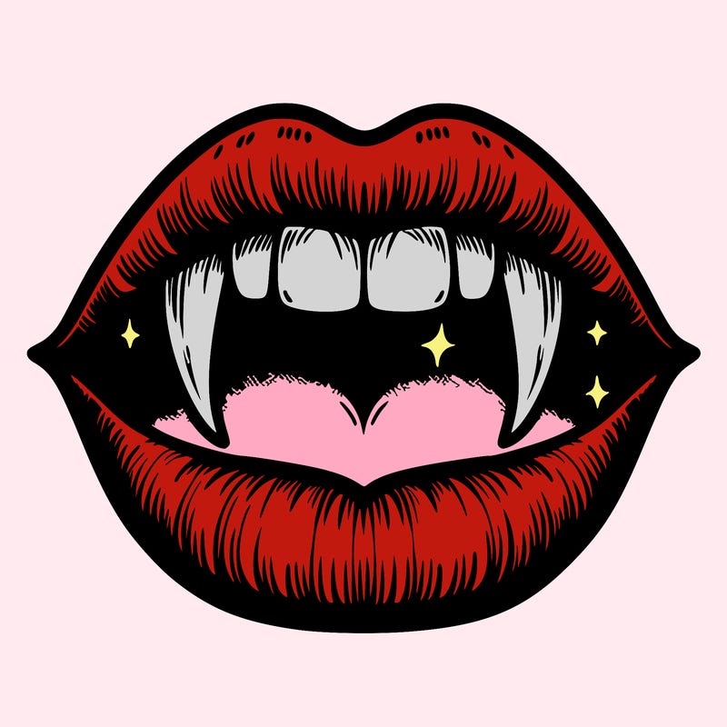 lips with vampire teeth