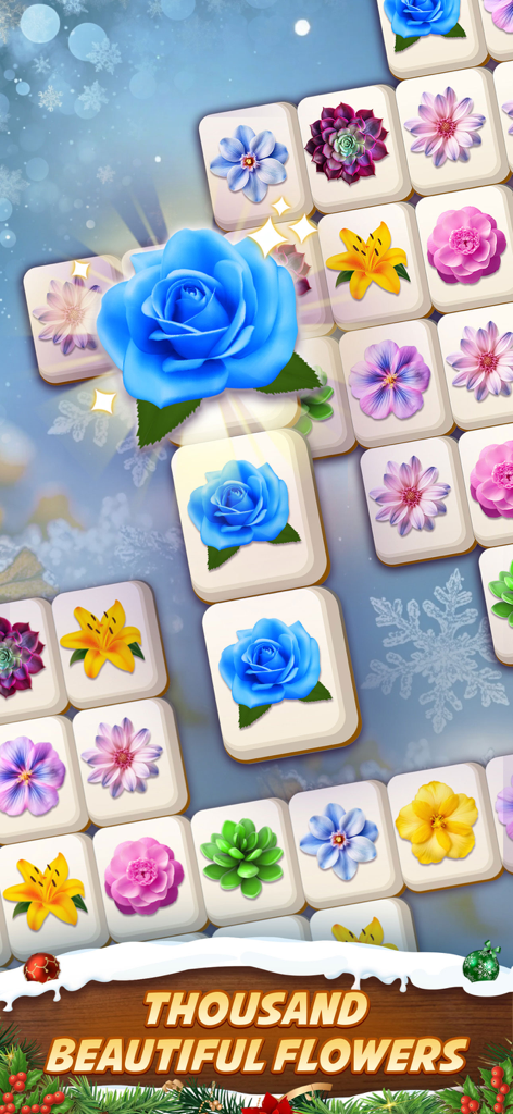 Zen Blossom: Flower Tile Match - 눈 덮인 겨울 배경의 화려한 꽃 타일을 보여주는 Zen Blossom 모바일 게임 인터페이스