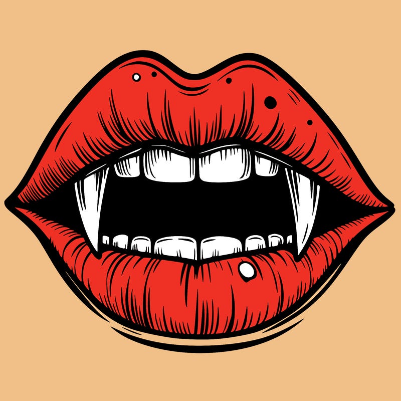 lips with vampire teeth