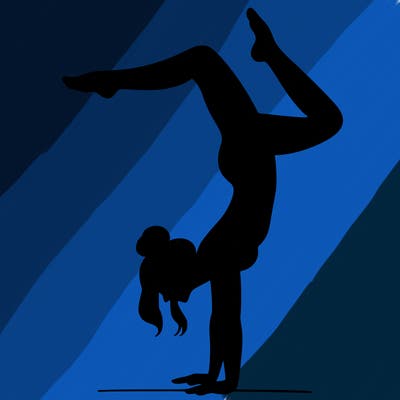 a woman doing a handstand