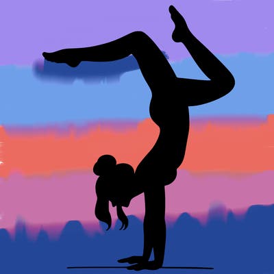 a woman doing a handstand