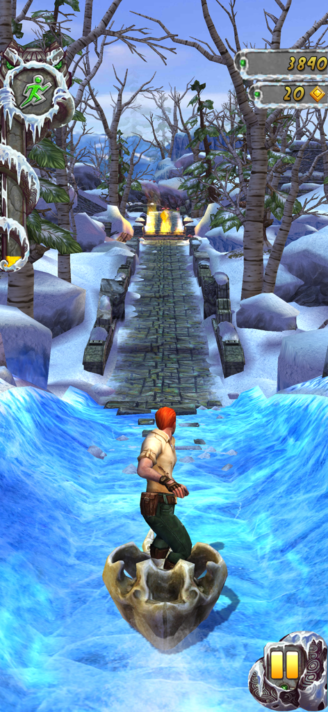 A character sliding down a frozen river in the Frozen Shadows map of Temple Run 2