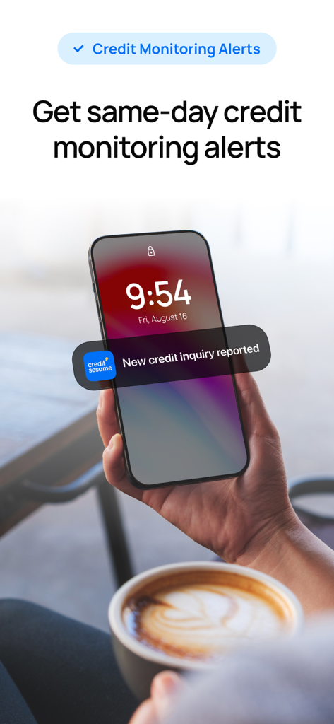 A person holding a smartphone showing a real-time Credit Sesame alert for a new credit inquiry