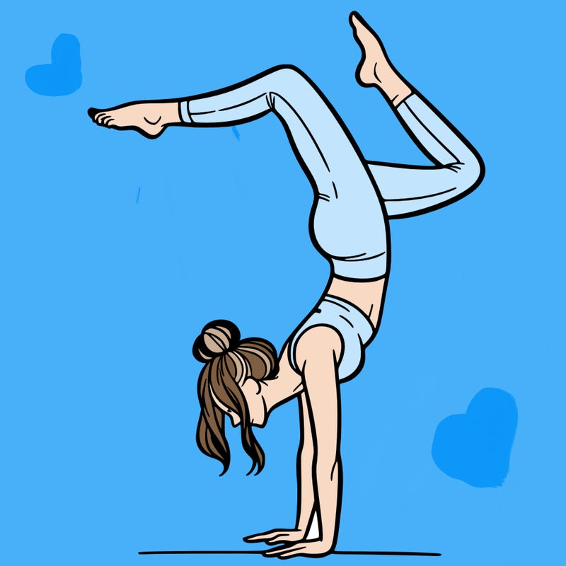 a woman doing a handstand