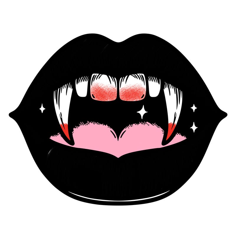 lips with vampire teeth