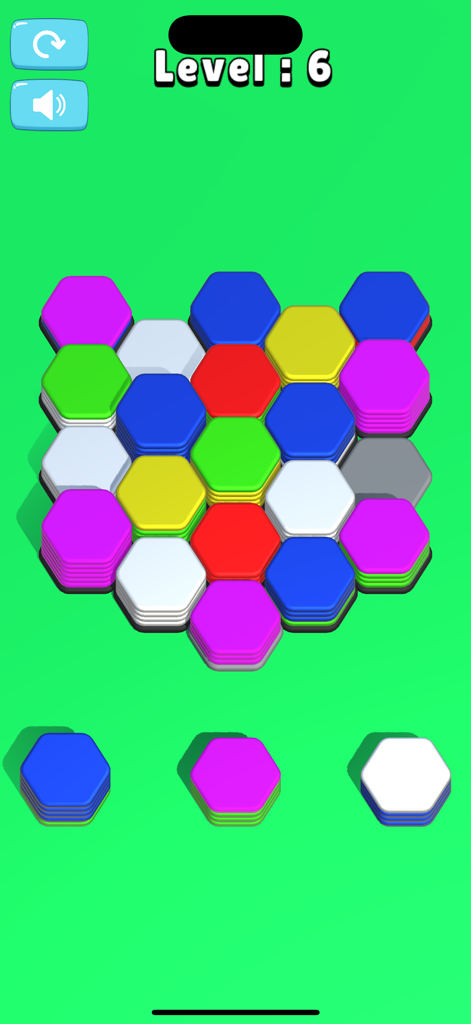 Hexa Sort Game - Gameplay of Hexa Sort Game with colorful hexagonal blocks on a green background