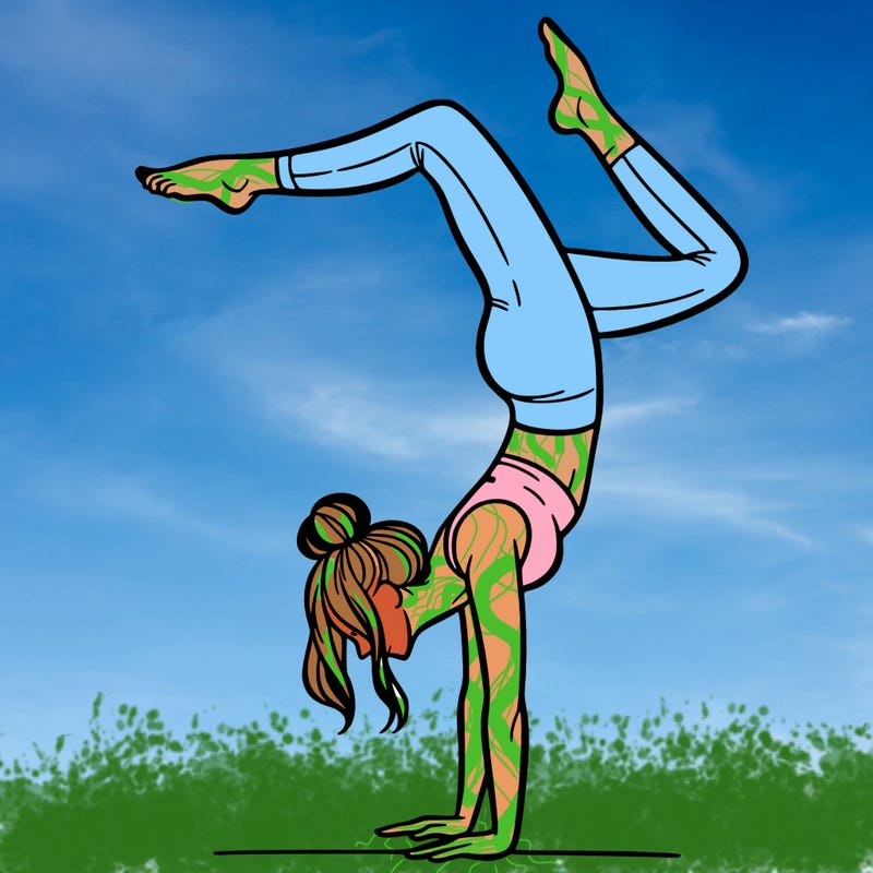 a woman doing a handstand