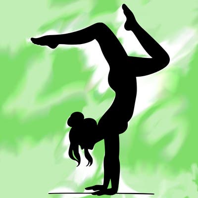a woman doing a handstand