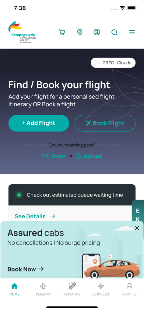BLR Airport - The home screen of the BLR Airport mobile app featuring flight booking options and an assured cab service banner.