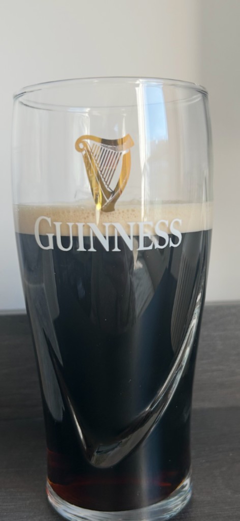 G-Score - A pint of Guinness with the foam head perfectly aligned to split the G in the logo