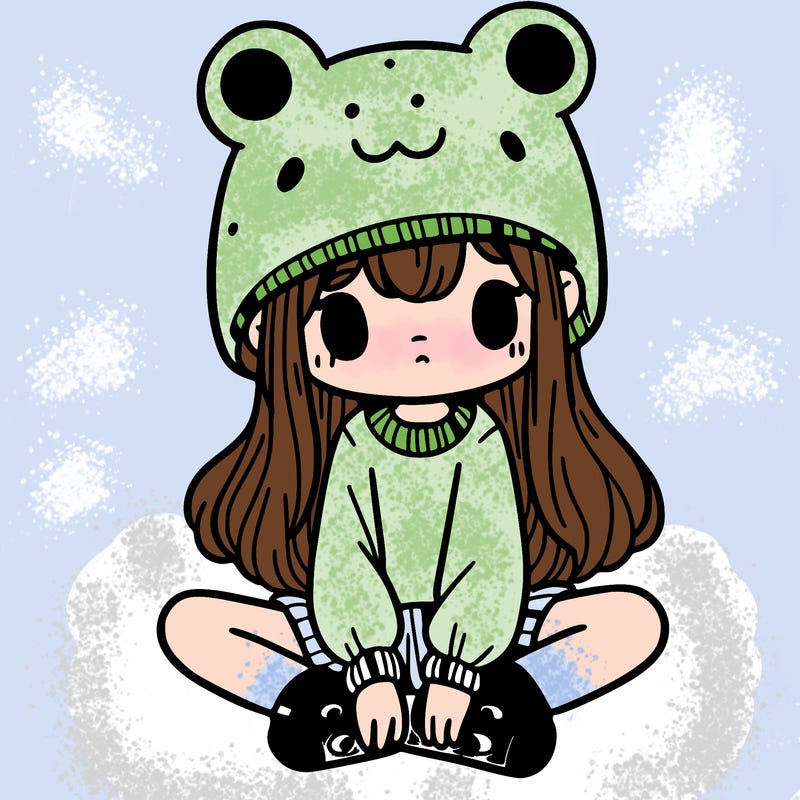 a girl wearing a frog hat and some frog socks