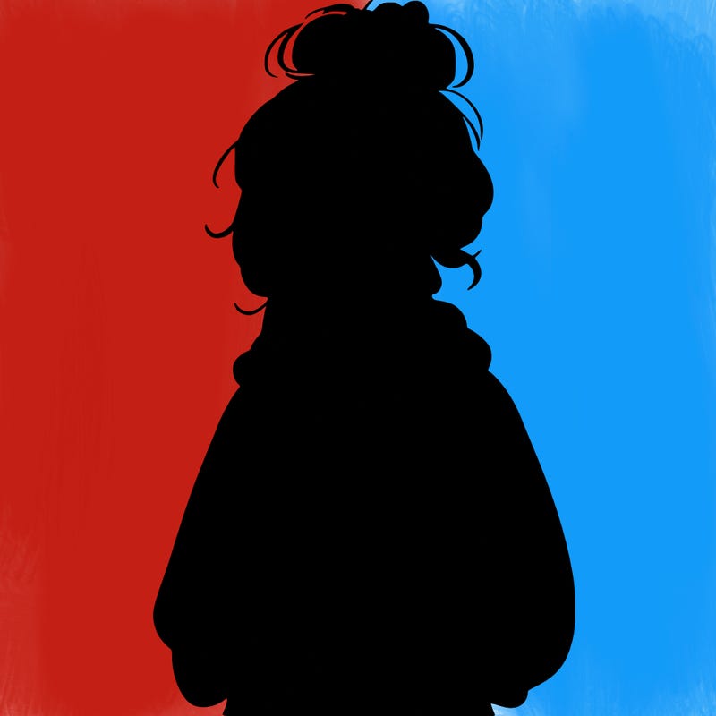 teen girl with a messy bun and glasses wearing a loose hoodie and jeans