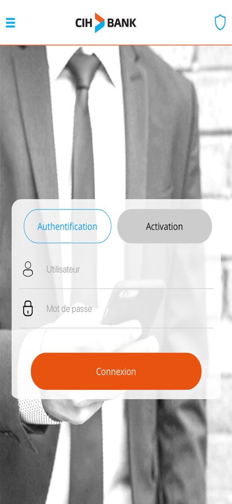 Login screen of the CIH MOBILE app featuring fields for username and password with a professional background.