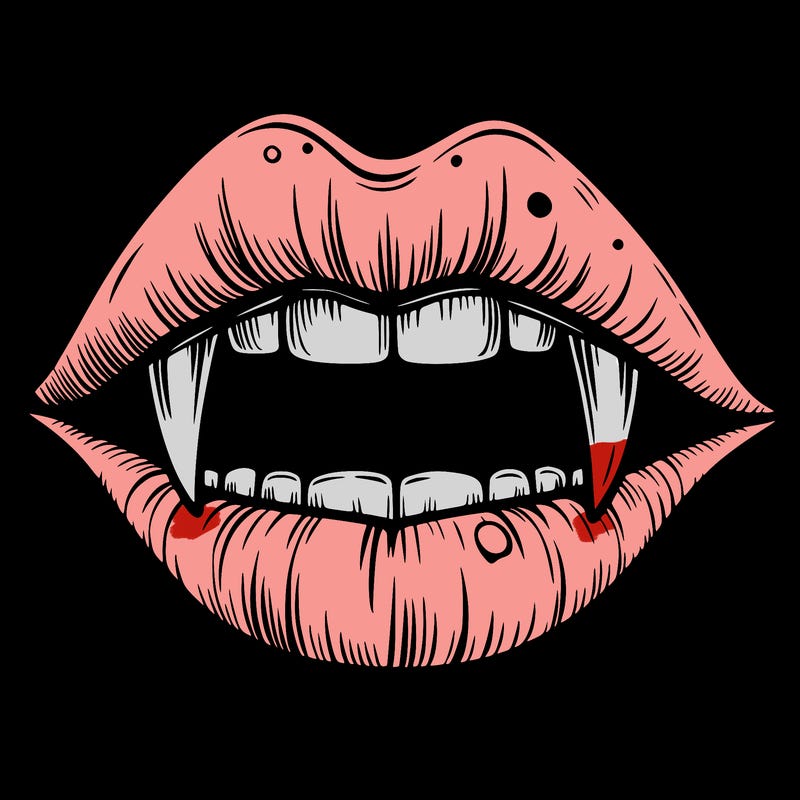 lips with vampire teeth